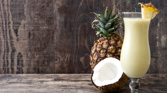 pina colada smoothie cocktail with pineapple and coconut